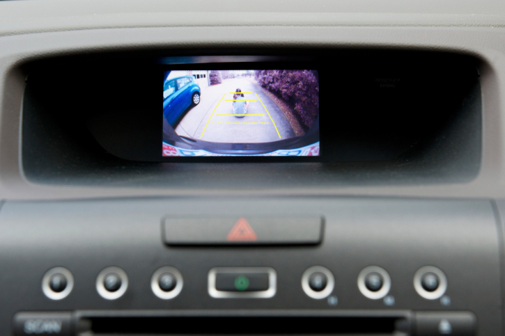 Vehicle back up camera display in the dashboard